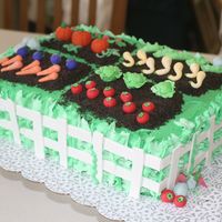 Garden Cake Made for teacher appreciation week. My first garden cake. White and chocolate cake with oreo whipped cream filling.