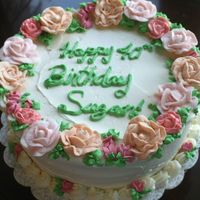 Rose Birthday Cake White cake with strawberry puree french buttercream.