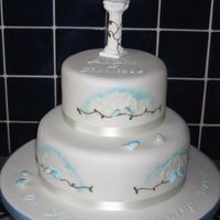 Our Little Birds This was a Christening cake for my friend's two adopted children. My friend saw a picture of a similar cake on haveyourcakeandeatit.co...