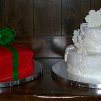 Chrismas Cakes The snowflake cake i made for the 24th and the present cake I made for the 25th, which was all chocolate. YUM