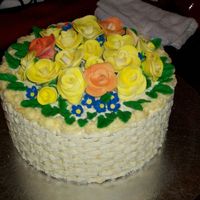 Orange Cake For Ochun basket weave made with orange buttercream and cake is orange cake with orange marmalade. roses, flowers and leaves made with gum paste,...