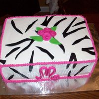 Simple Zebra Simple zebra and pink cake. Double 9x13 strawberry swirl cake. Buttercream icing with fondant accents.