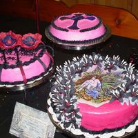 Picture_002.jpg My Granddaughter wanted a Goth (now called Emo) cake for her birthday. The Fairy is an edible image. Lillies are royal icing. Celtic cross...