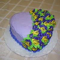 Dsc00035.jpg This cake was done for my daughter's 25th birthday. I had a lot of fun doing the pansies.