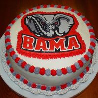 Bama Cake 10" 4 layer white cake done with buttercream icing. The Bama Logo was done in colorflow. I raffled this and the Auburn cake off.