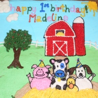 Farm Animal Birthday Cake made for a one year old's birthday, with side view and a separate haystack smash cake. Picture taken from a napkin of a farm...