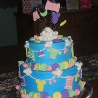 Clotheslines And Clouds Fun baby shower cake for a friend's daughter, inspired by Wilton and many on this site. Vanilla enhanced butter cake with Chocolate...