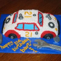 21St Birthday For Aspiring Mechanic 'Confetti' cake with BC frosting and fondant tools using Wilton car pan. The 'tires' have nuts for 'locks'!