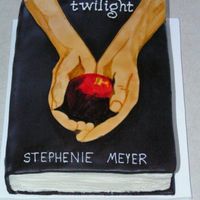Twilight Cake Cake was for my oldest daughter's 13th birthday party. Frosted in BC, then covered in chocolate MMF, colored black. RI piping for...