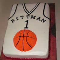 Winter Sports Assembly Cake Ii Very last minute cake for our school's sports assembly. Half sheet cake with half of ball pan. All BC.