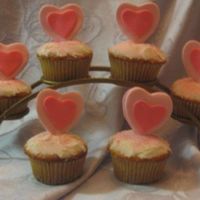 Sweetheart Cupcakes Almond cupcakes with almond buttercream frosting. The hearts are made from marshmallow fondant. I'm normally not a big fan of heart-...