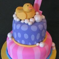 Just Ducky Made to match the first birthday rubber ducky party tableware from Oriental Trading Company. All decorations are fondant. Bubbles painted...