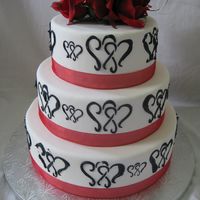 Stensil Wedding Cake The heart stensil was harder to use than I thought it was going to be. Need more practice but it came out ok.