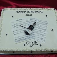 Sheet Music Full sheet cake with sheet music made from rice paper. Plastic violin.