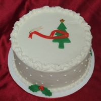 Christmas Tree Dove wrapping ribbon on Christmas tree.