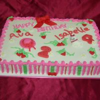 Strawberry Shortcake Meets Hello Kitty 9x13 iced in buttercream with fondant accents.