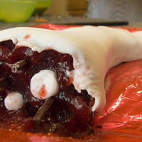 Dead Arm Cake My son requested a "dead arm cake" for his sixth birthday. This is a side view of the cake. It was totally disgusting and a huge...