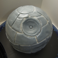 Death Star This is a cake I did for my brother's birthday. I used the Wilton ball pan. It is dark chocolate with almond buttercream and fondant....