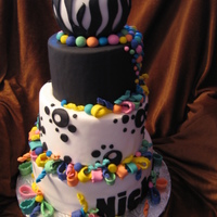 Wacky Rainbow Cake I made this cake based on another CCer's picture. Only the bottom layer is real, the rest is styrofoam.