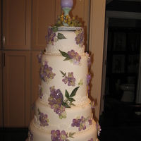 Wow Cake... This cake was done form new sister in law who is super crafty!!! They crystalized flowers for me and cryastaized the topper which was made...