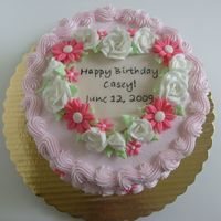 New Baby's Birthday Short notice cake for newborn's birthday. Dark chocolate cake w/ BC frosting and fondant daisies and handpainted plaque. TFL!