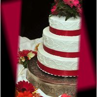 Pretty In Pink Cake was yellow pudding pound cake with BC icing, real flowers and ribbon. The bride loved it =)