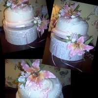 Lily Pink Bridal Shower I really enjoyed doing this cake! I worked on the gumpaste flowers on & off thru the week. The cake is covered in fondant, the hanky is...