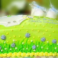 Onesie And Booties Cake bc with fondant onesie and booties.