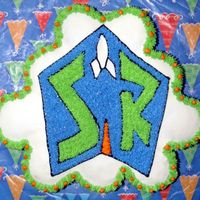 Buzz Lightyear Space Ranger Cupcake Cake Here is my first cupcake cake. It was for my son and is of the Space Ranger emblem found on the sleeve of Buzz Lightyear's uniform. My...