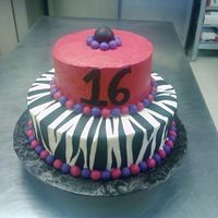 Sweet 16 Buttercream with fondant stripes and border.