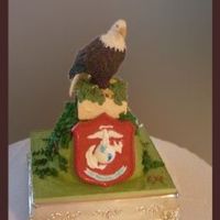 Marine Eagle MOG ordered this cake for her son & was ready to pay for it too! She had a statue that we used as inspiration. The eagle was homemade...
