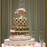 Debbine's Pink Dream This was an unusual sized cake. Hard to tell from the picture 6in 5tall, 10in 8tall, 14in 10tall, 16in 3tall. The colors were Lt pink &...