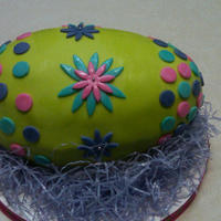 Easter Egg lime green carved easter egg. The cake is gluten Free with a chocolate Ganache filling.