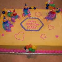 Clown Birthday Cake Buttercream icing and clowns on chocolate cake