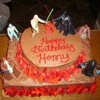 Star Wars Cake Cake for my nephew's 5th birthday. Chocolate buttercream frosting; one vanilla and one chocolate cake (1/4 sheet & 8 inch round)....