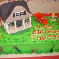 Bob The Builder 5Th Birthday Chocolate 1/2 sheet cake with buttercream frosting. Bob, Scoop, and construction signs are plastic. Tools are wax candles. House is fondant...