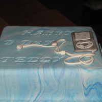 Teddy's Ipod Cake butterscotch cake with marbled fondant and an ipod made to look exartly like his own.