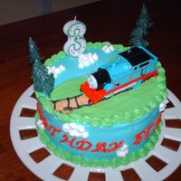 Thomas The Tank I made this for my son's 3rd birthday. I had just finished Wilton 1 and the techniques I learned really made a difference.