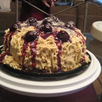 Spaghetti And Meatballs white cake with a nutella buttercream filling, with buttercream for the spaghetti. Meatballs are Ferraro Rocher cany and sauce is Rasberry...