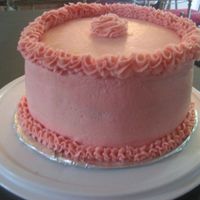 Mom's Birthday Cake chocolate raspberry cake with milk chocolate truffle and raspberry buttercream filling