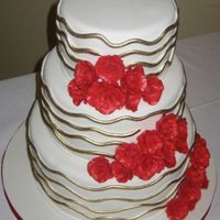 Red & Gold Wavy lines painted with gold luster dust and red gumpaste roses.