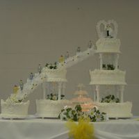 Joined In Splendor White cake with white icing. 16X12X8 and 12X8 and 8.