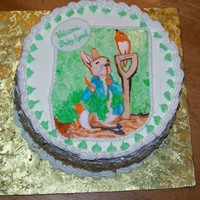 Rabbit Cake 10" Carrot with crusting cream cheese frosting. Hand painted rabbit scene on fondant.