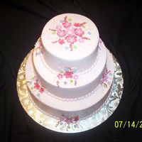 Kanitz Party This is a 6-9-12 buttercream creation with gumpaste flowers.