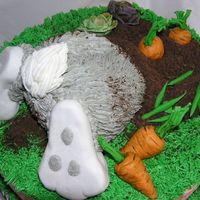 Bottom's Up! I took susanscakebabies great idea and added an Easter spin to it. Almond cake, orange marmelade filling. Veggies are gumpaste, feet are...