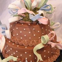 Baby Bows Colette Peters design. The brown on the topper actually DID match the cake in real life - don't know what happened in the photo....