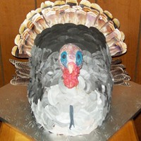 Turkey They wanted a turkey with feathers and a beard so I tried my best. The large feathers are printed rice paper. All other decorations are a...