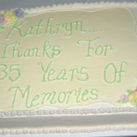 Kathrynretirement.jpg This cake is for a lady who is retiring after 35 years at our town's only bank. It is an 11x 15 sheet cake. They asked for Spring...