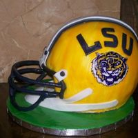 Lsu Helmet Cake Helmet cake, covered in fondant. Hand painted LSU tigers on side of helmet. Thanks for looking!