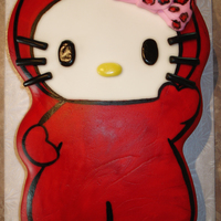 Hello Kitty Little Devil Cake was carved from a 1/4 sheet and covered in MMF and painted.